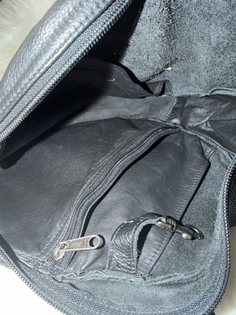 Black Textured Leather Sling Backpack for Men